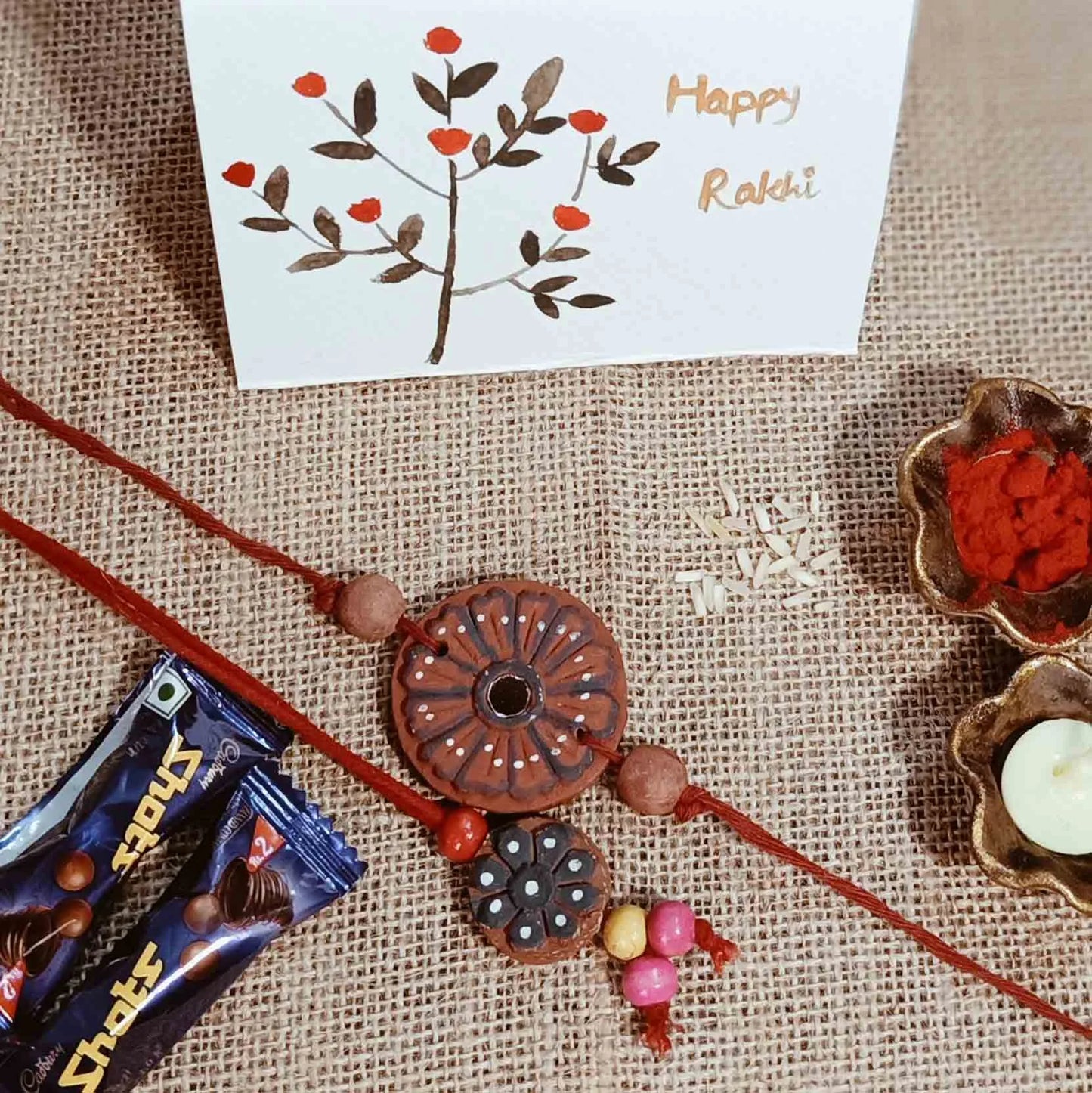 Kutch Painted Pottery Traditional Terracotta Clay Craft Rakhi & Lumba Festive Hamper