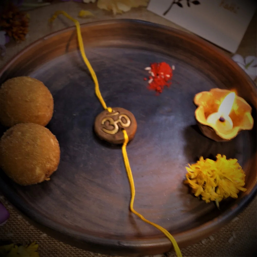 'Om' Bio-degradable Clay Rakhi Hamper