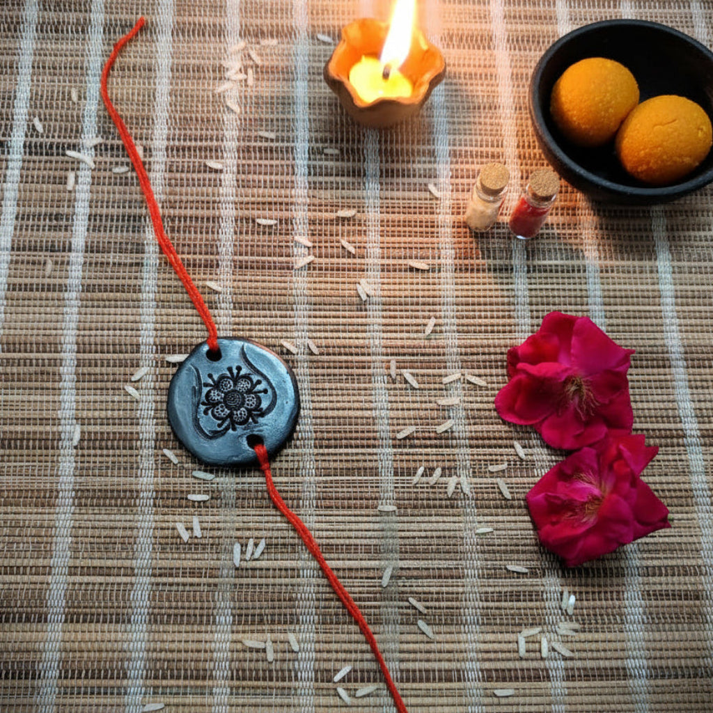 Sawai Madhopur Black Pottery Rakhi Hamper Floral Pattern